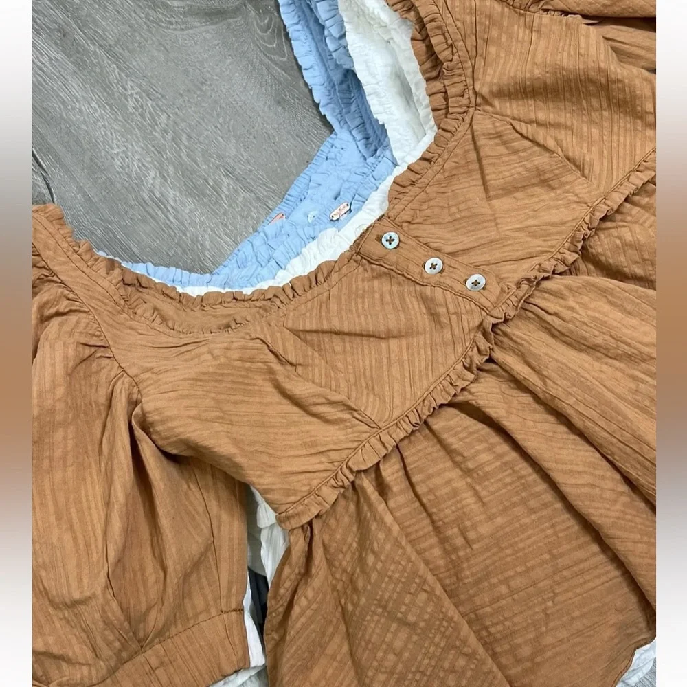 NWOT Free People Leave It To Me Burnt Orange Peplum Blouse